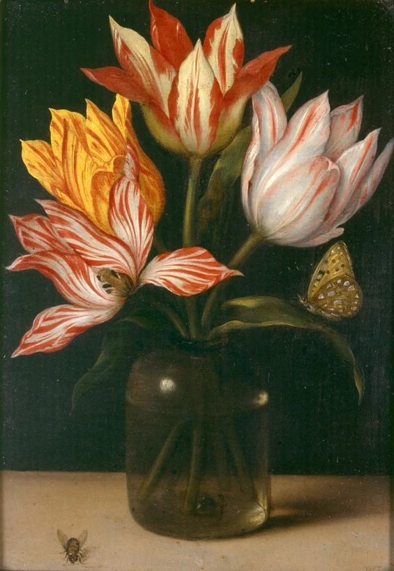Natura morta con tulipani in un vaso di vetro